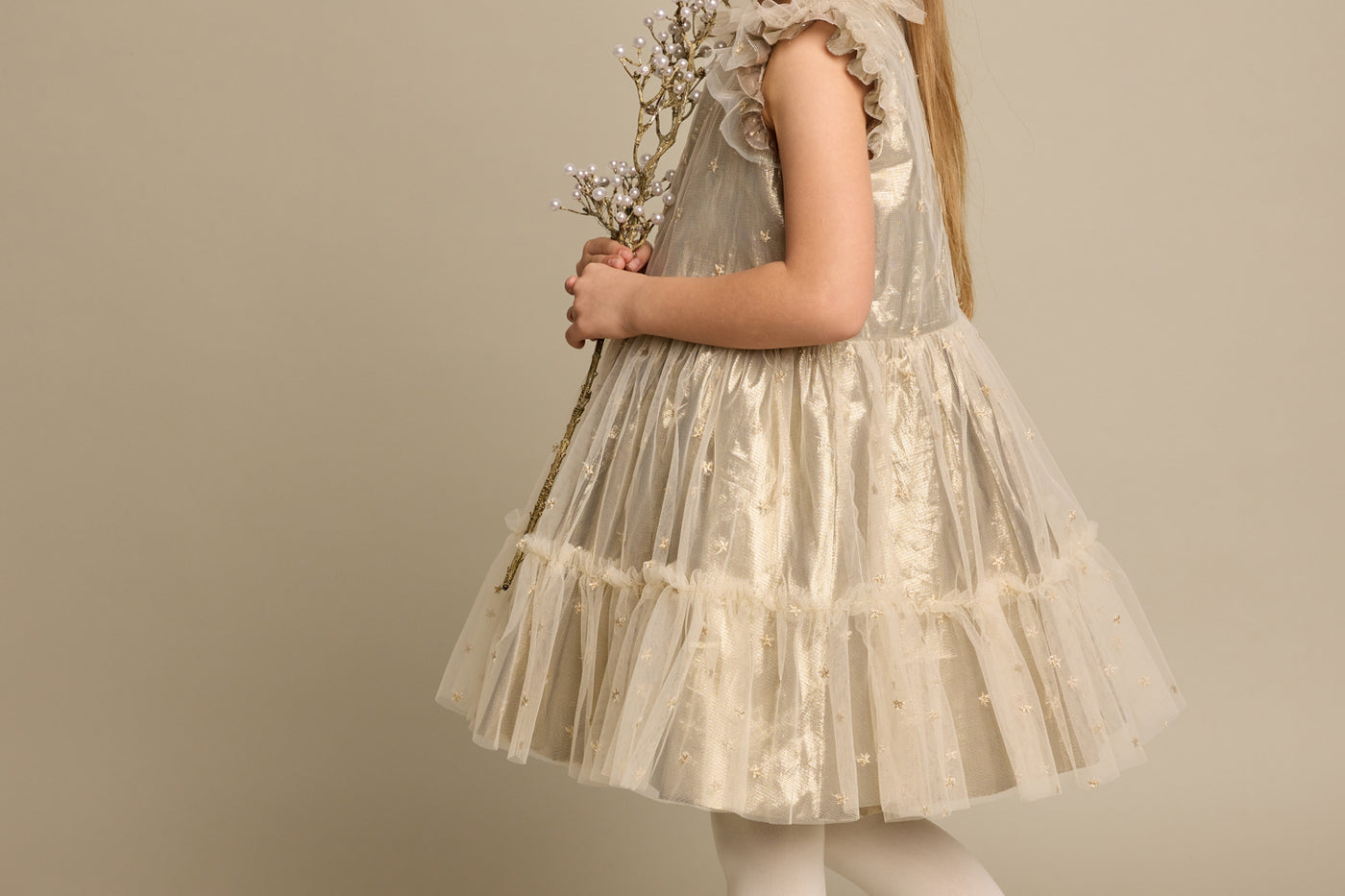 Winter 2023 girl's look golden dress