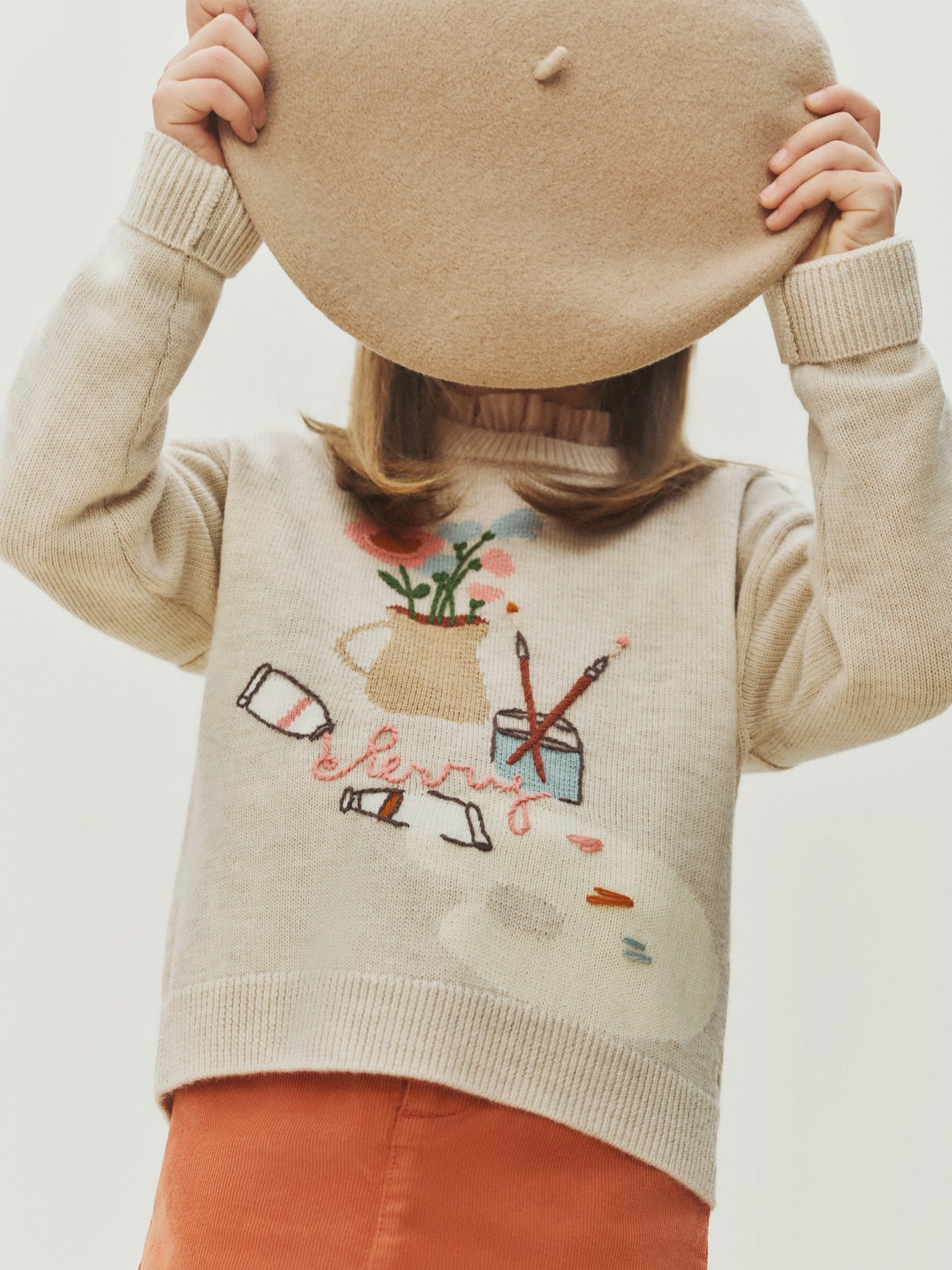 Tahini sweater with hand embroidered painter's workshop