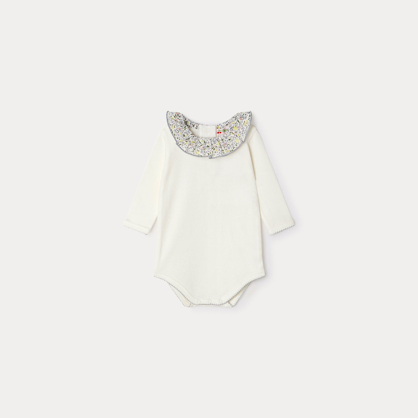 Bonpoint pearl newborn onesie with blue floral collar
