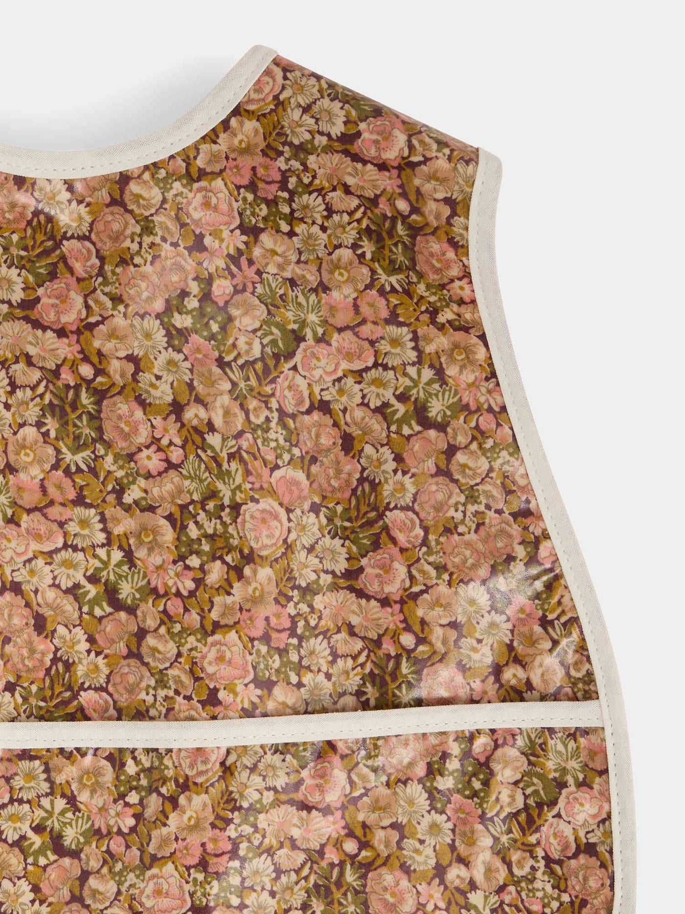 Adjustable Jlip bib in Liberty fabric in coated cotton