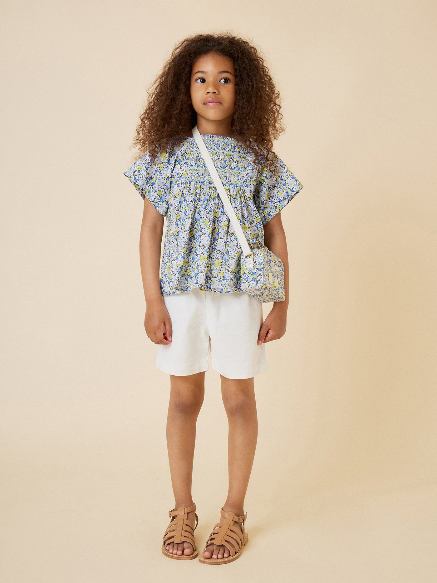 Summer 2024 girl's look hand-embroidered and smocked blouse