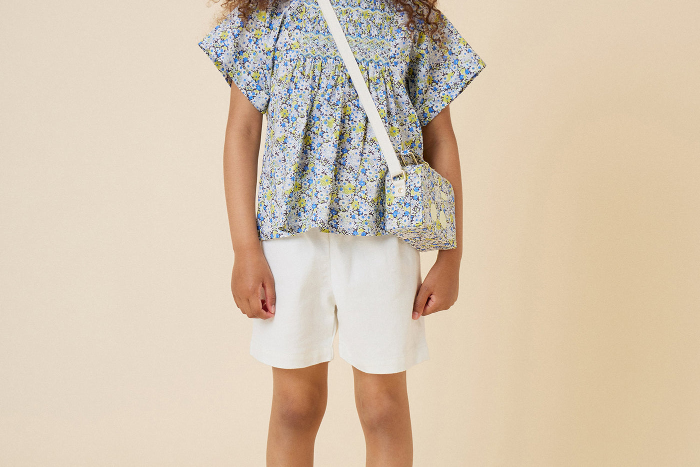 Summer 2024 girl's look hand-embroidered and smocked blouse