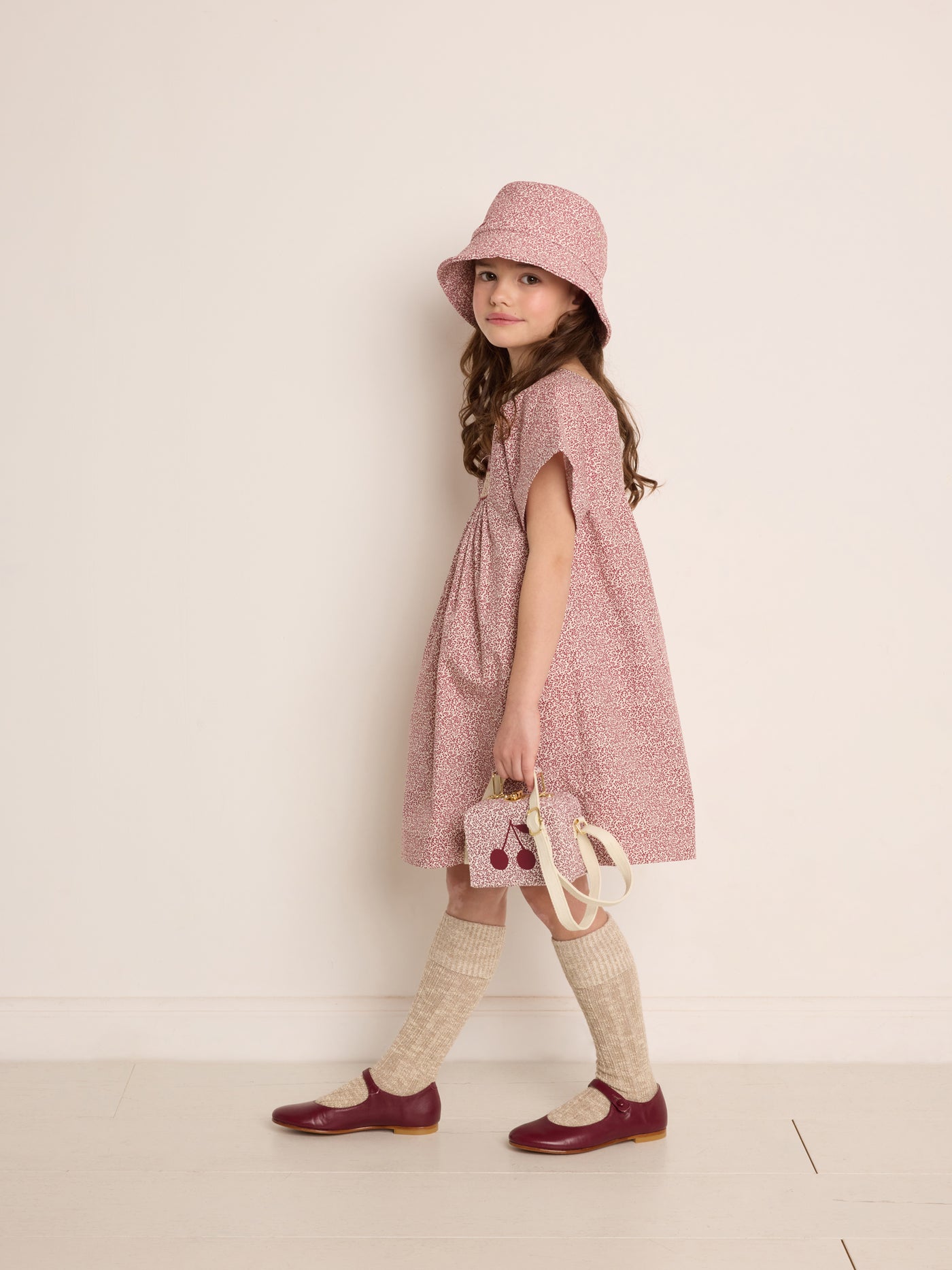 Winter 2023 girl's look smocked dress