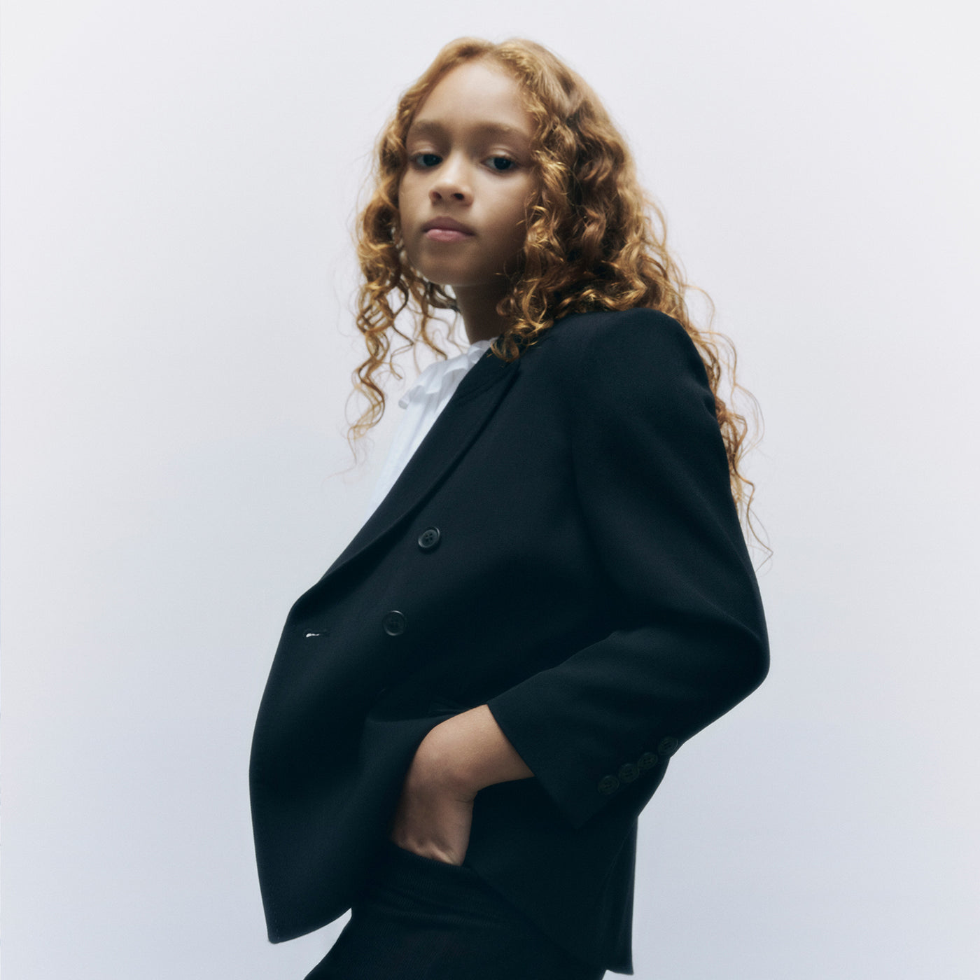 Bonpoint x Khaite girl with a black jacket