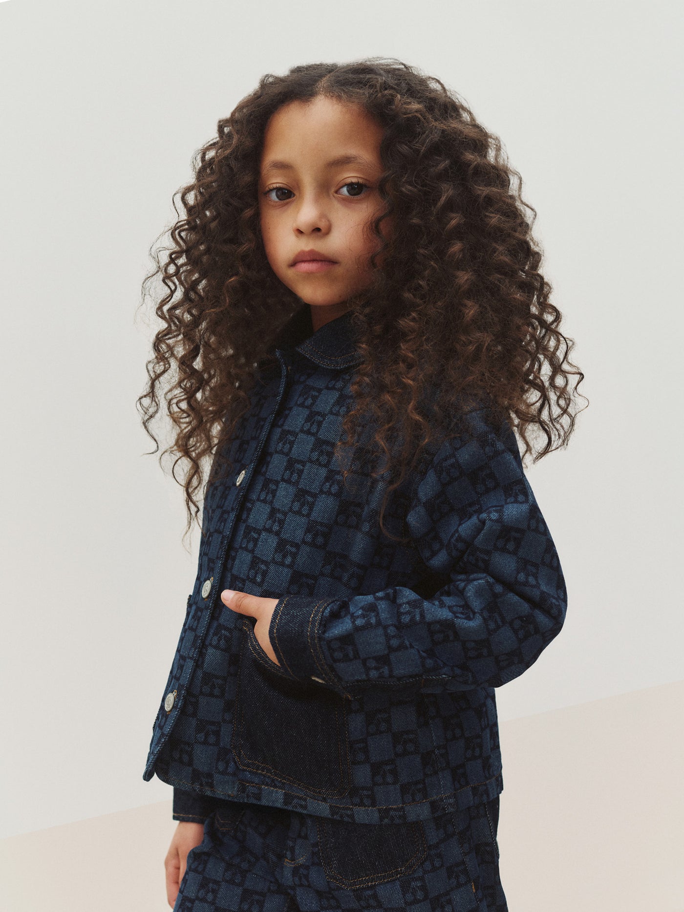 Marity quilted jacket with Peter Pan collar and cherry checkerboard print in organic cotton
