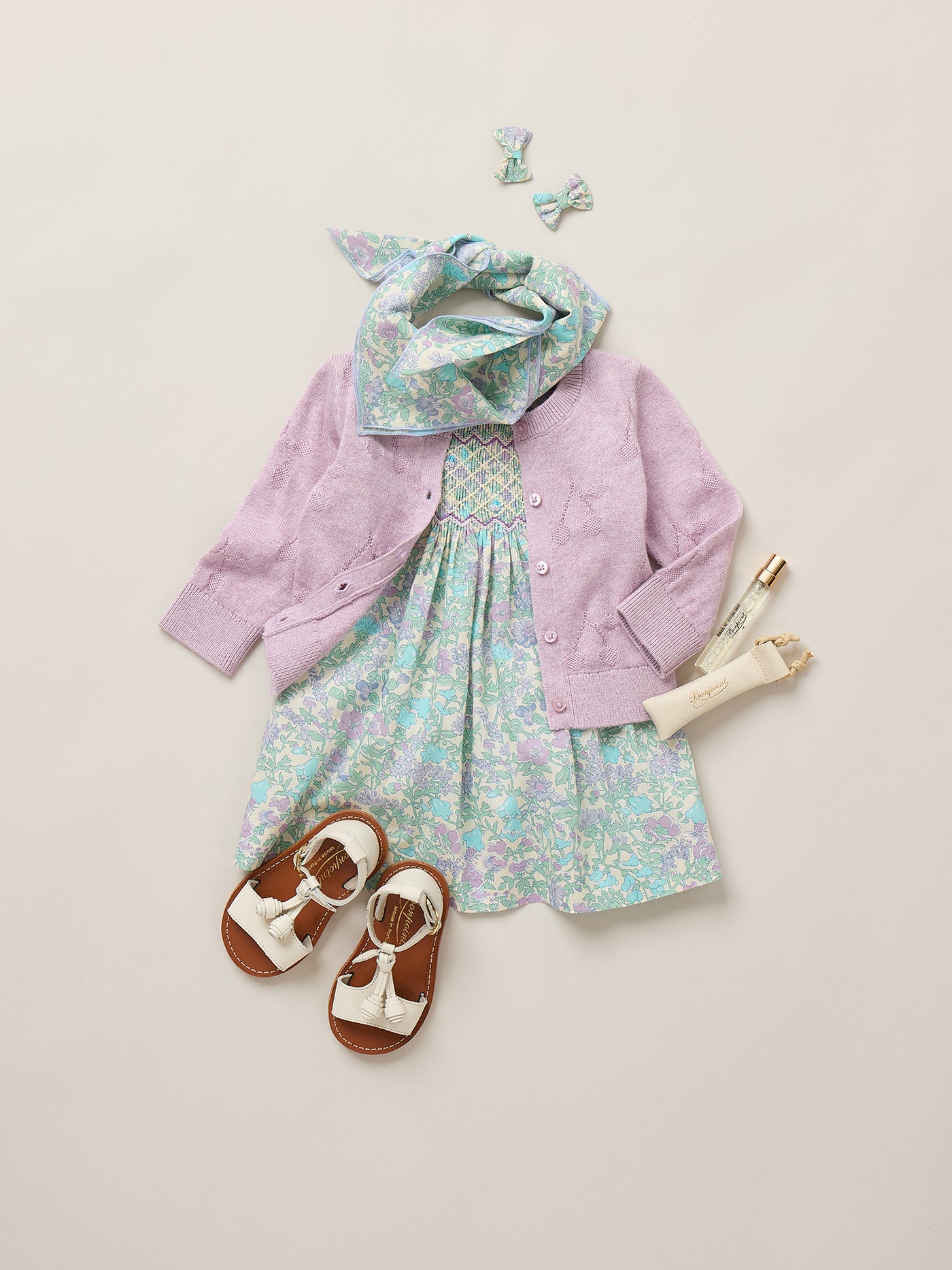 Smocked and hand-embroidered Pais dress in Liberty organic cotton fabric