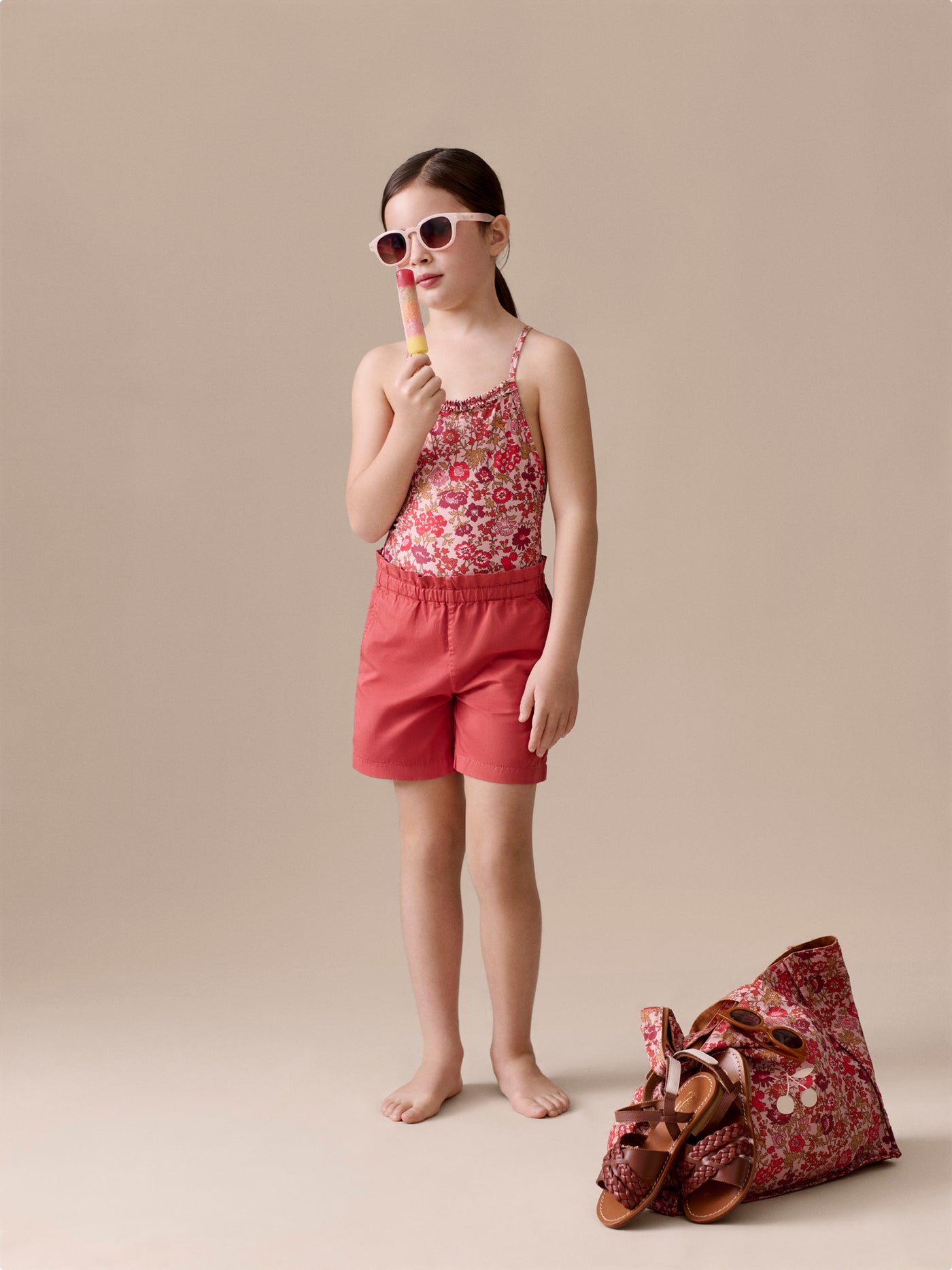 Laika one-piece swimsuit with pink flowers in Liberty fabric