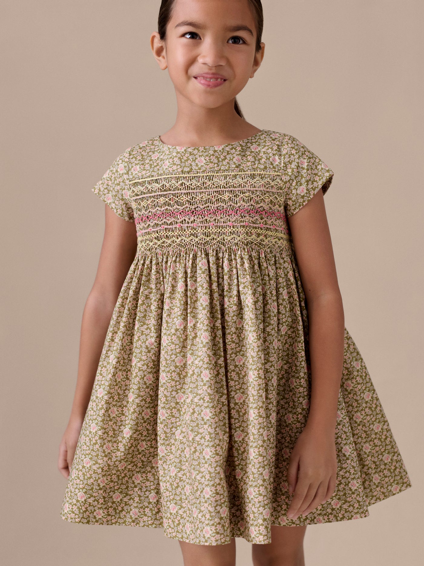 Duchesse dress smocked and hand-embroidered in Liberty organic cotton fabric