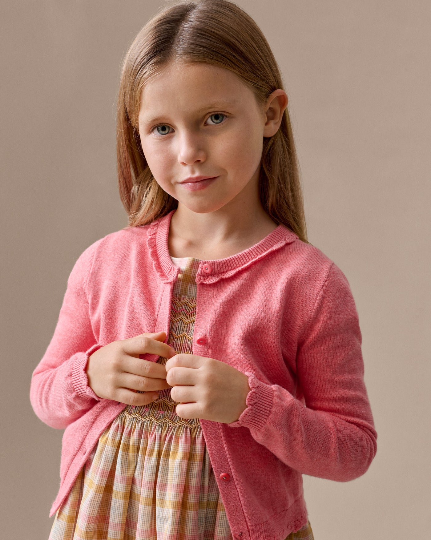 Duchesse dress in a smocked hand-embroidered check pattern in organic cotton