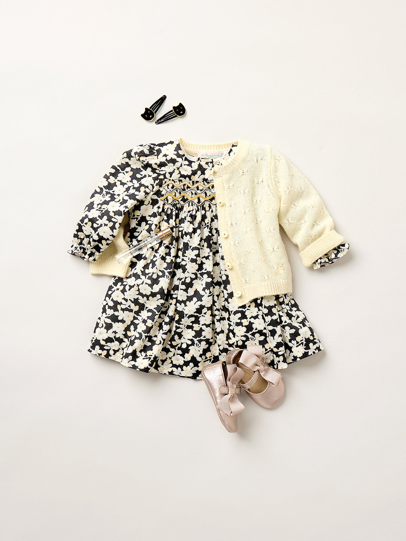 Jailys smocked and embroidered dress in Liberty fabric in organic cotton