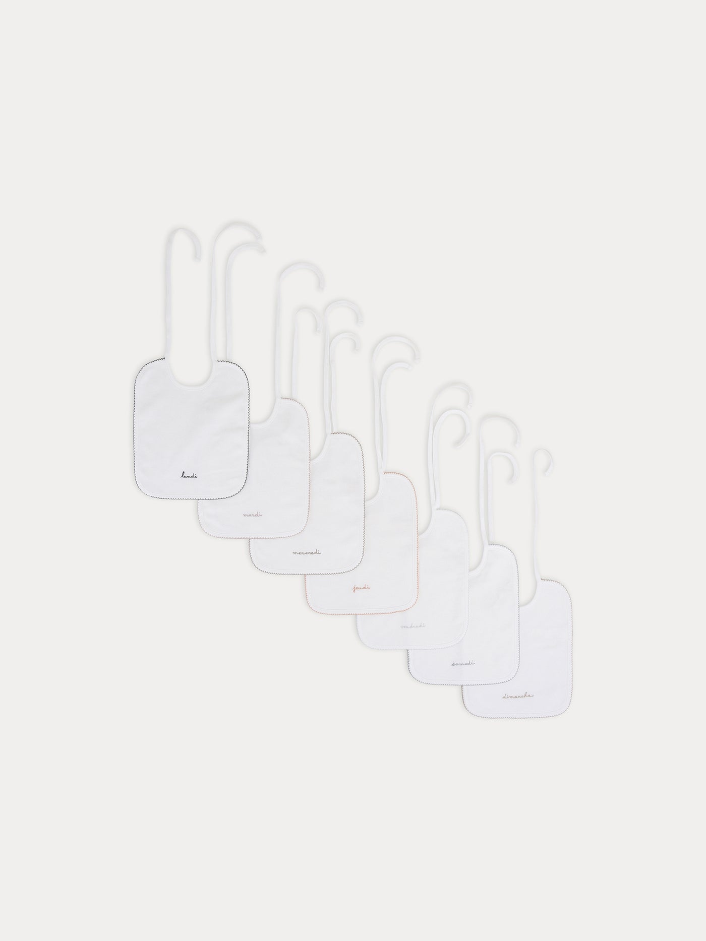 Set of embroidered bibs White