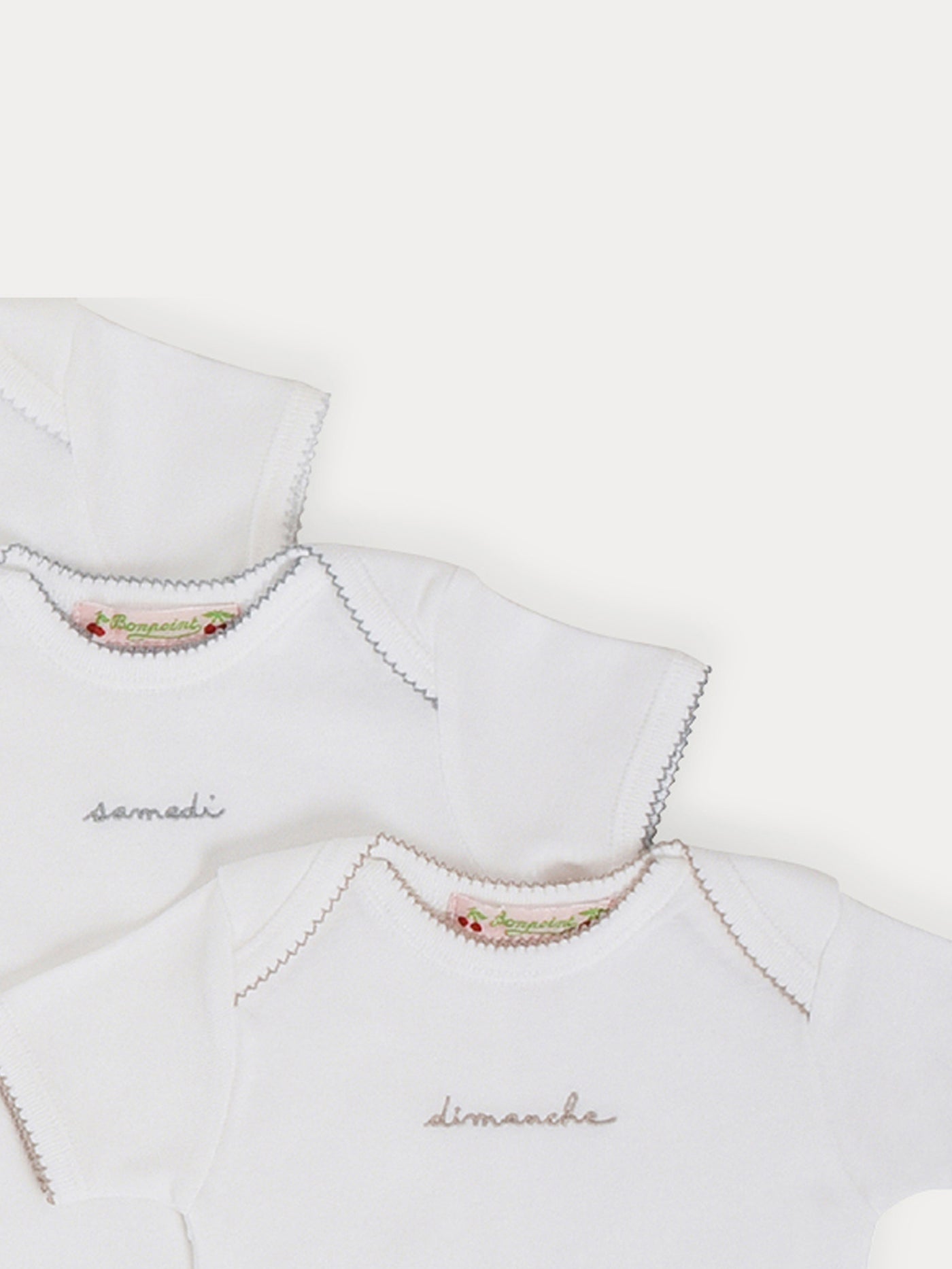 Baby Day-of-the-Week Onesies white