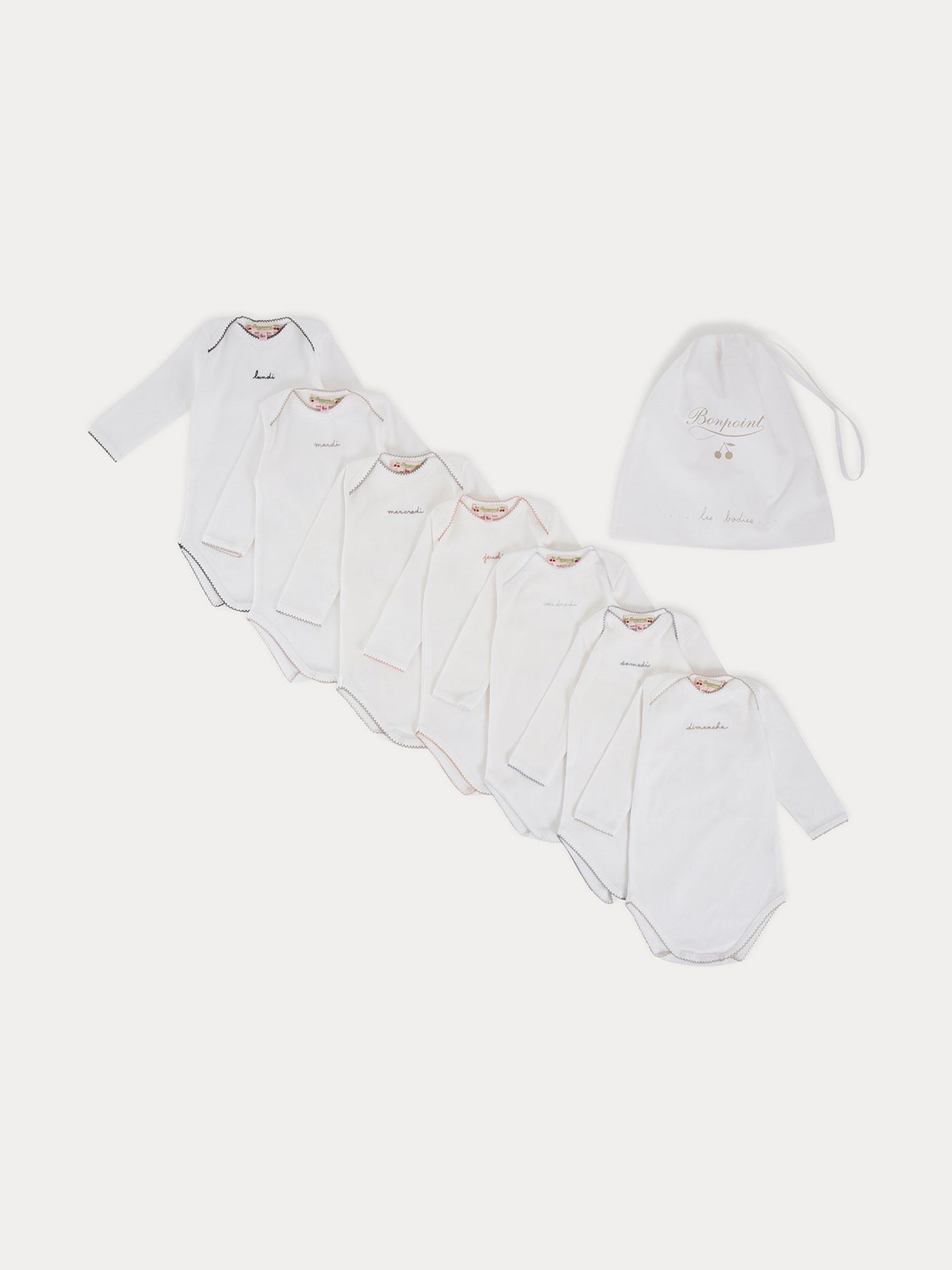 Signature suitcase and weekly long-sleeve bodysuits