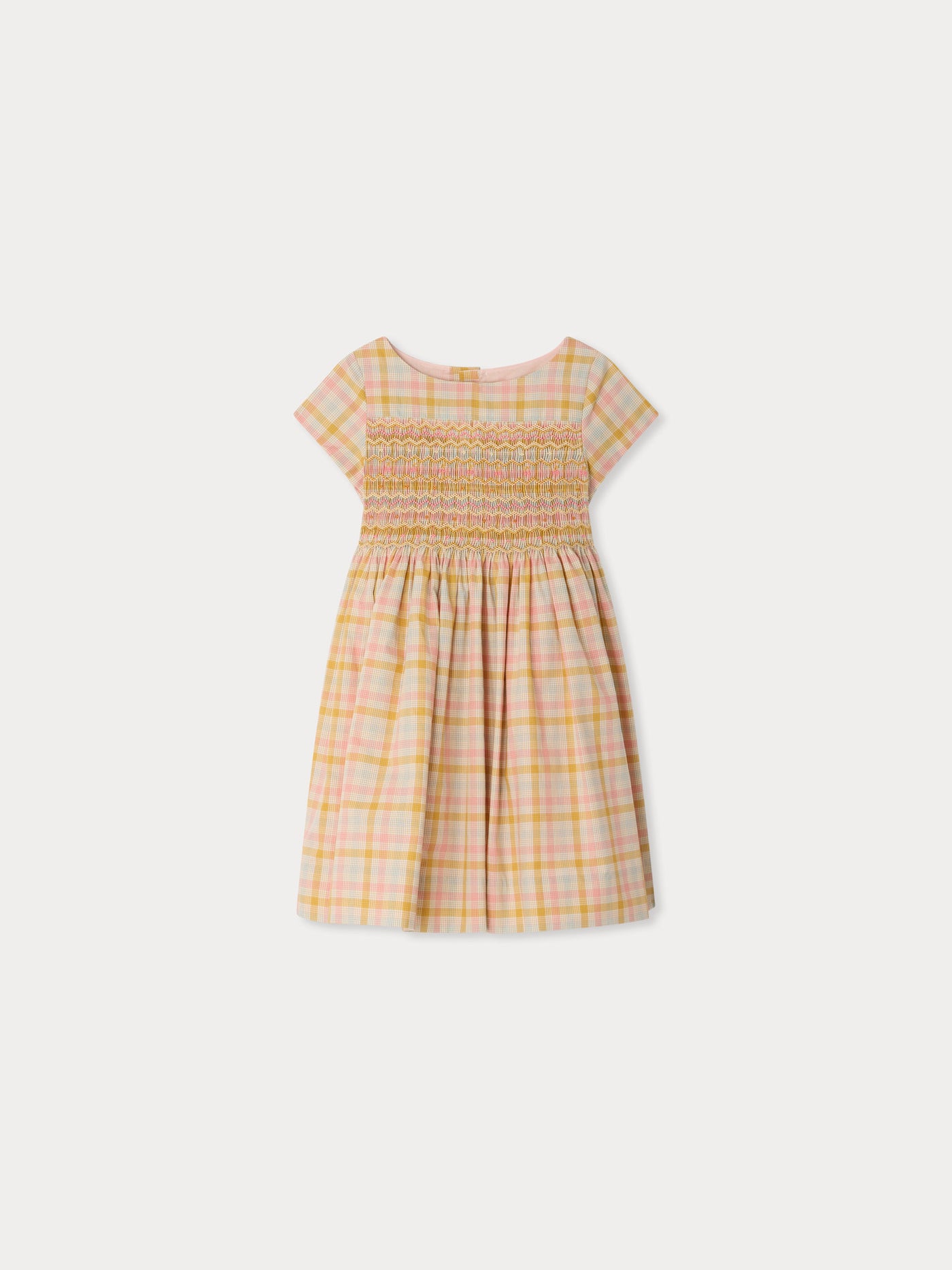 Duchesse dress in a smocked hand-embroidered check pattern in organic cotton