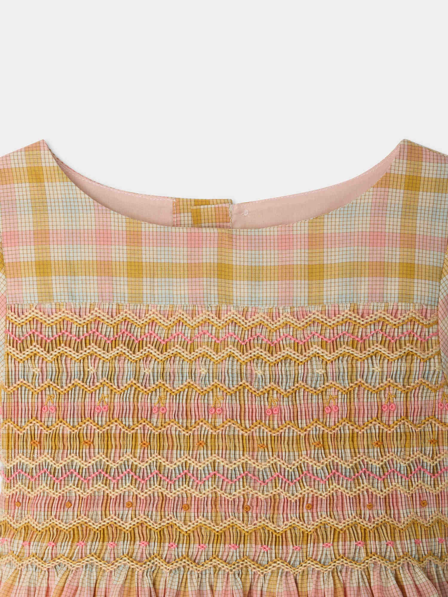 Duchesse dress in a smocked hand-embroidered check pattern in