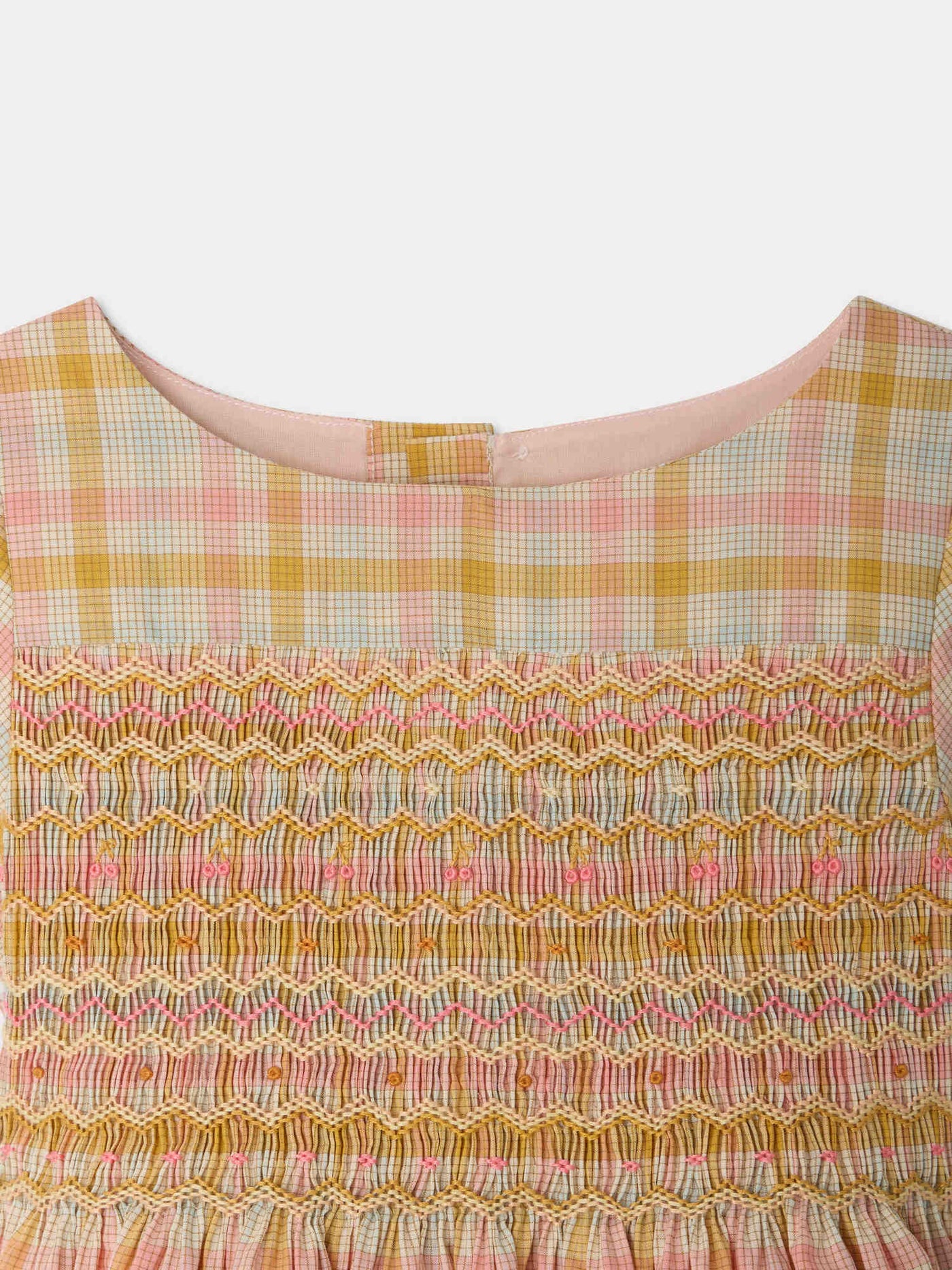 Duchesse dress in a smocked hand-embroidered check pattern in organic cotton