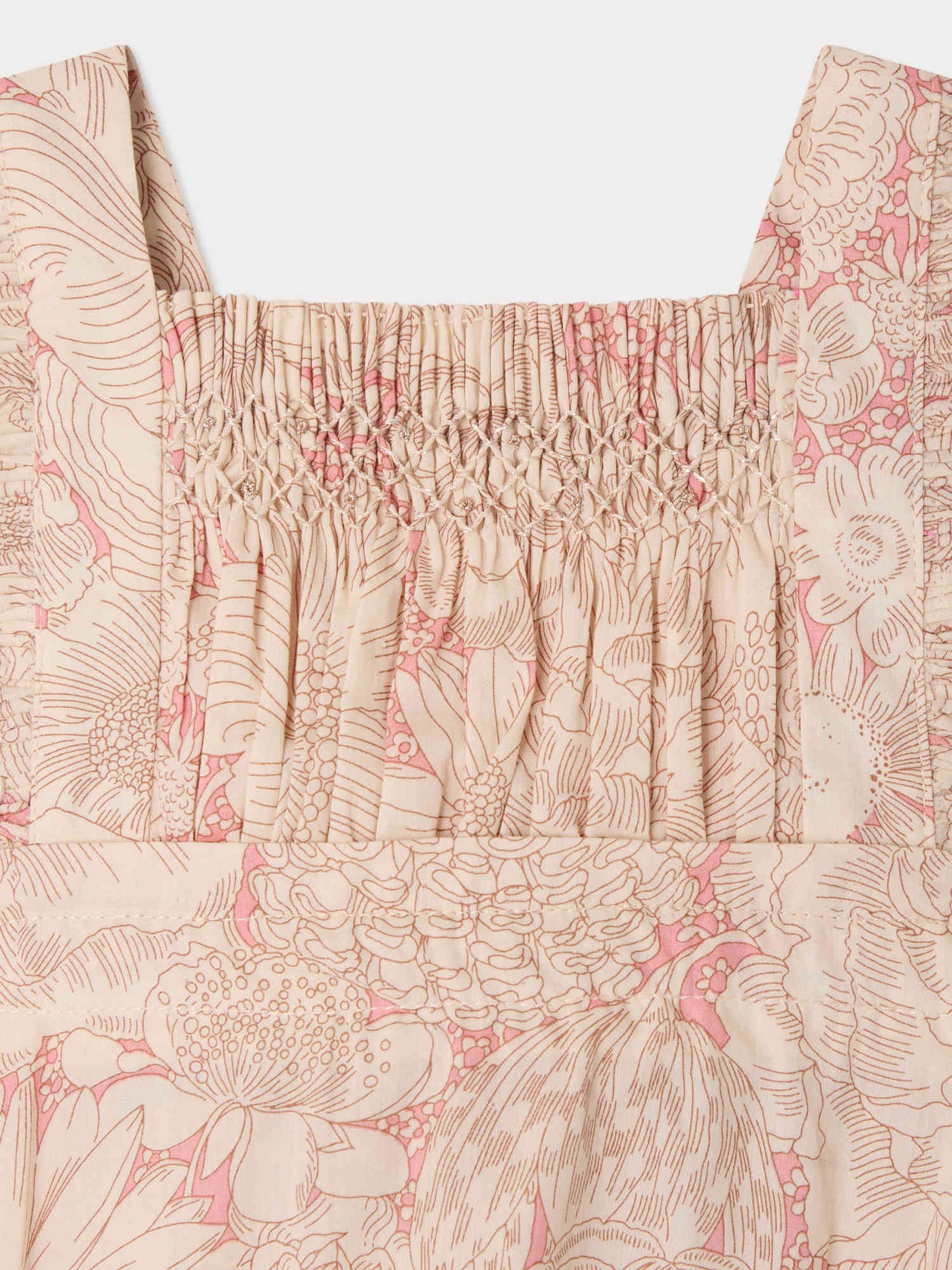 Lakiss romper smocked and hand-embroidered in Liberty organic cotton fabric