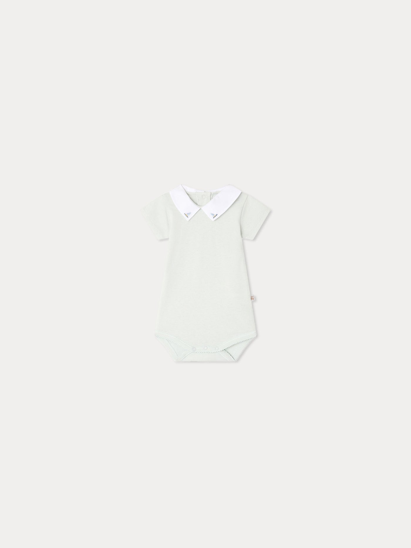 Juillet bodysuit with hand-embroidered sailboats in organic cotton