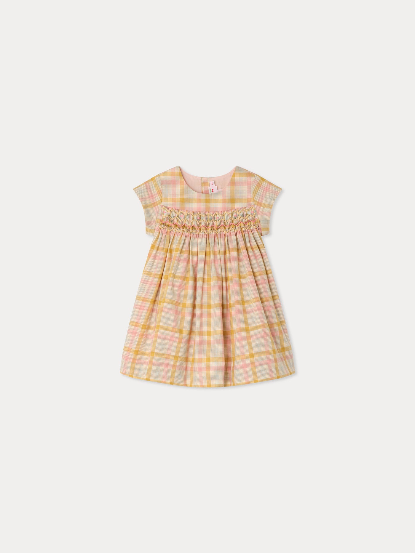 Maruska smocked and hand-embroidered dress in organic cotton