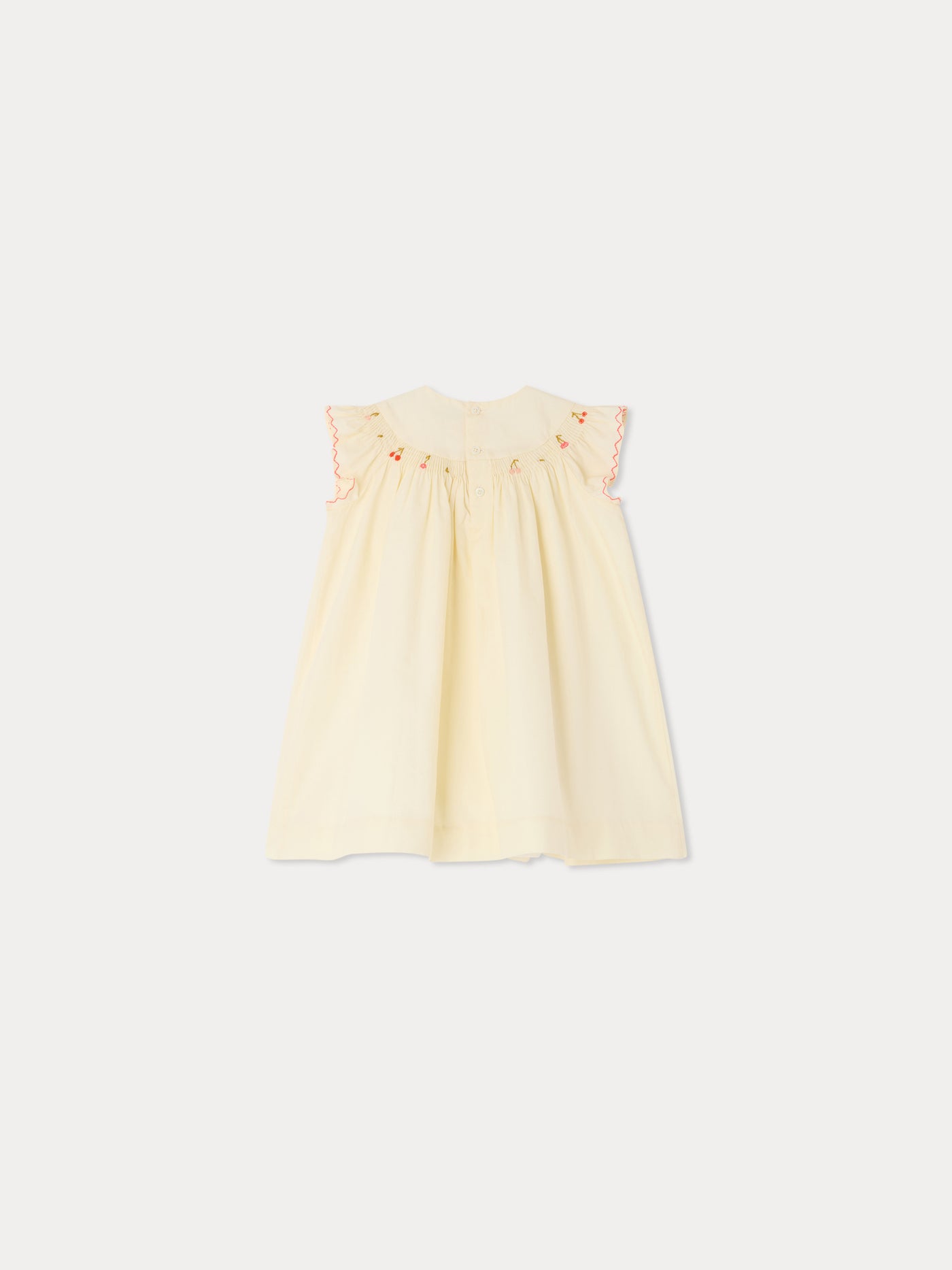 Amantine smocked and hand-embroidered dress in organic cotton