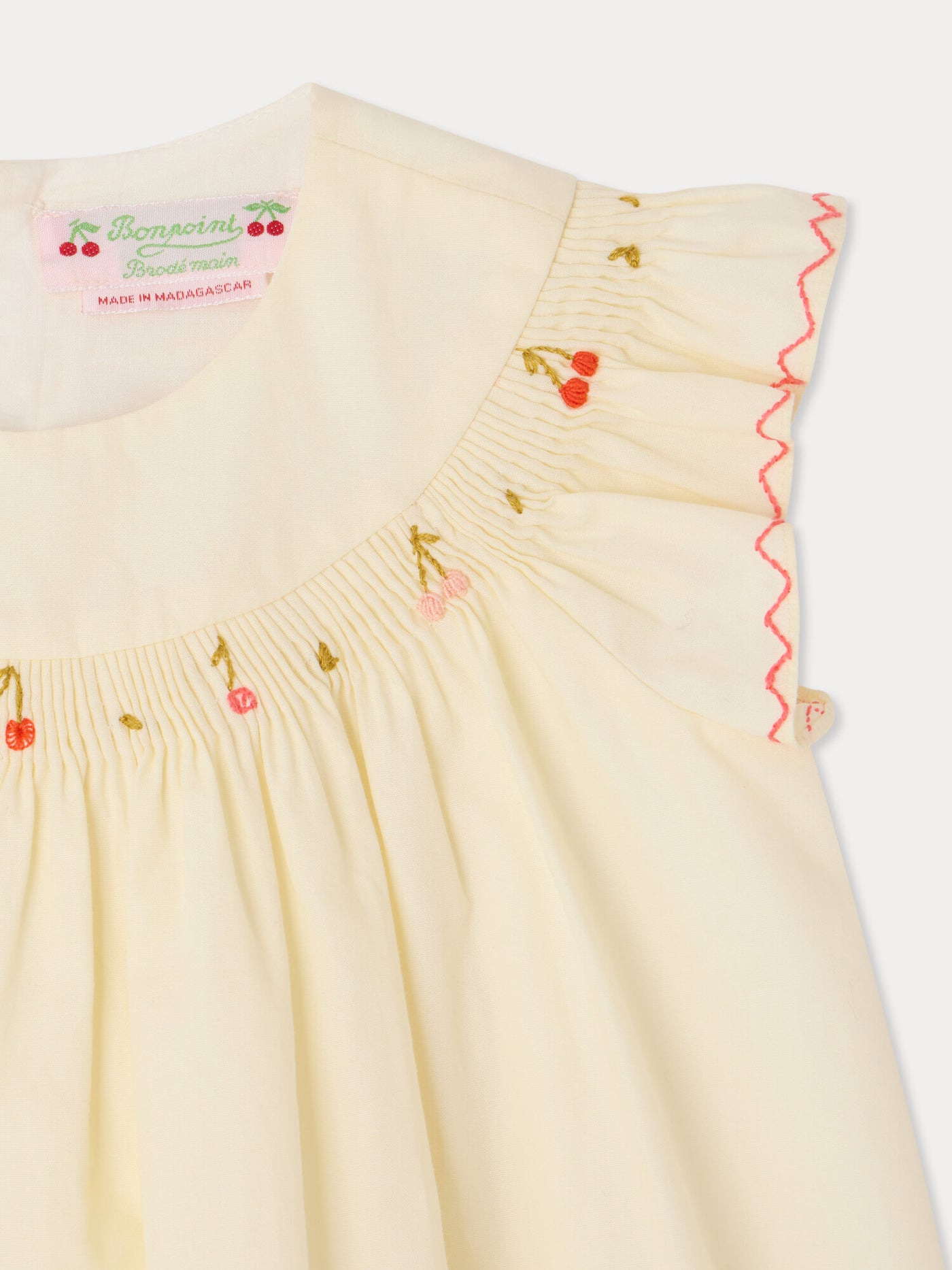 Amantine smocked and hand-embroidered dress in organic cotton