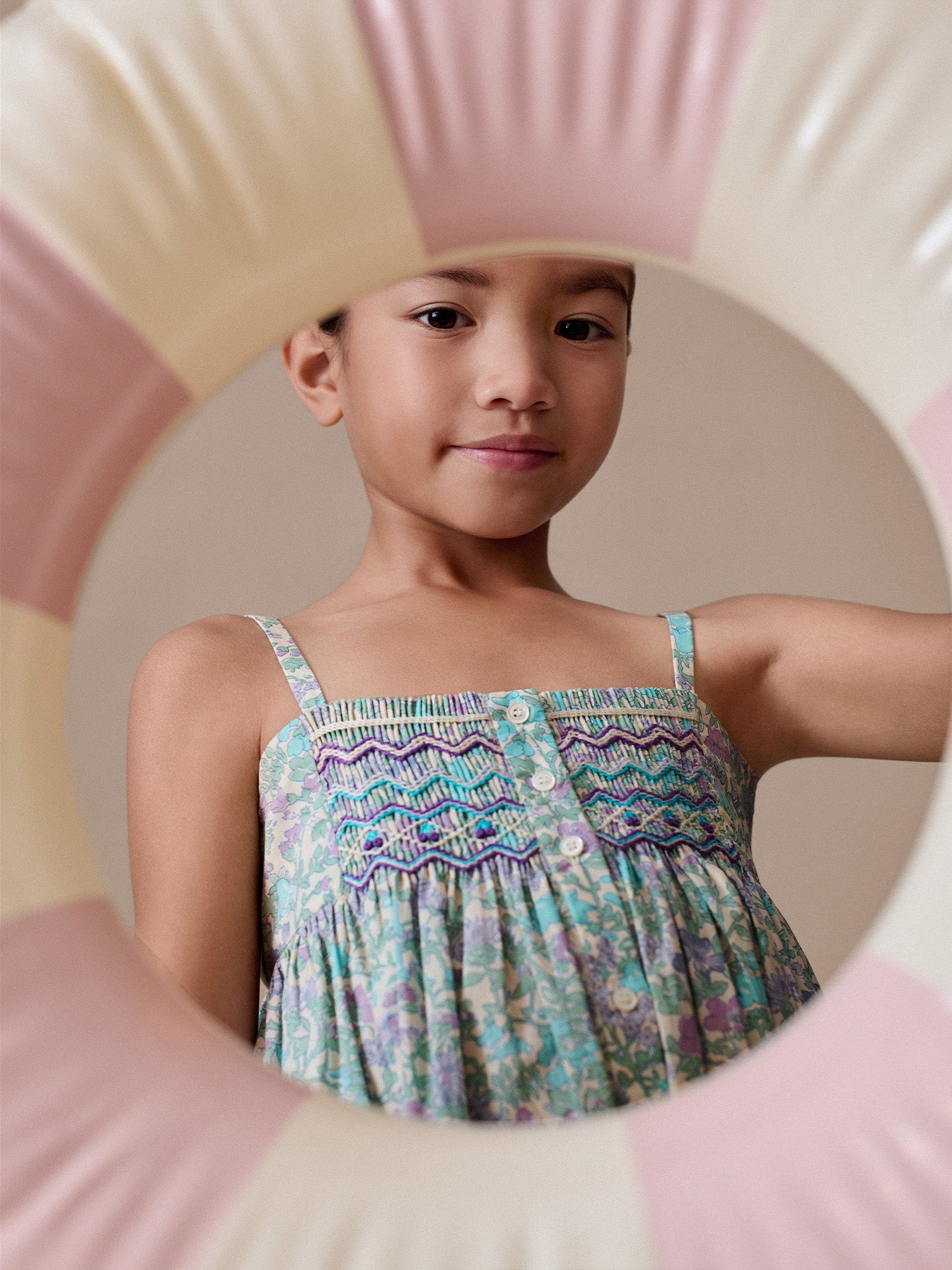 Passion dress smocked and embroidered in Liberty fabric in organic