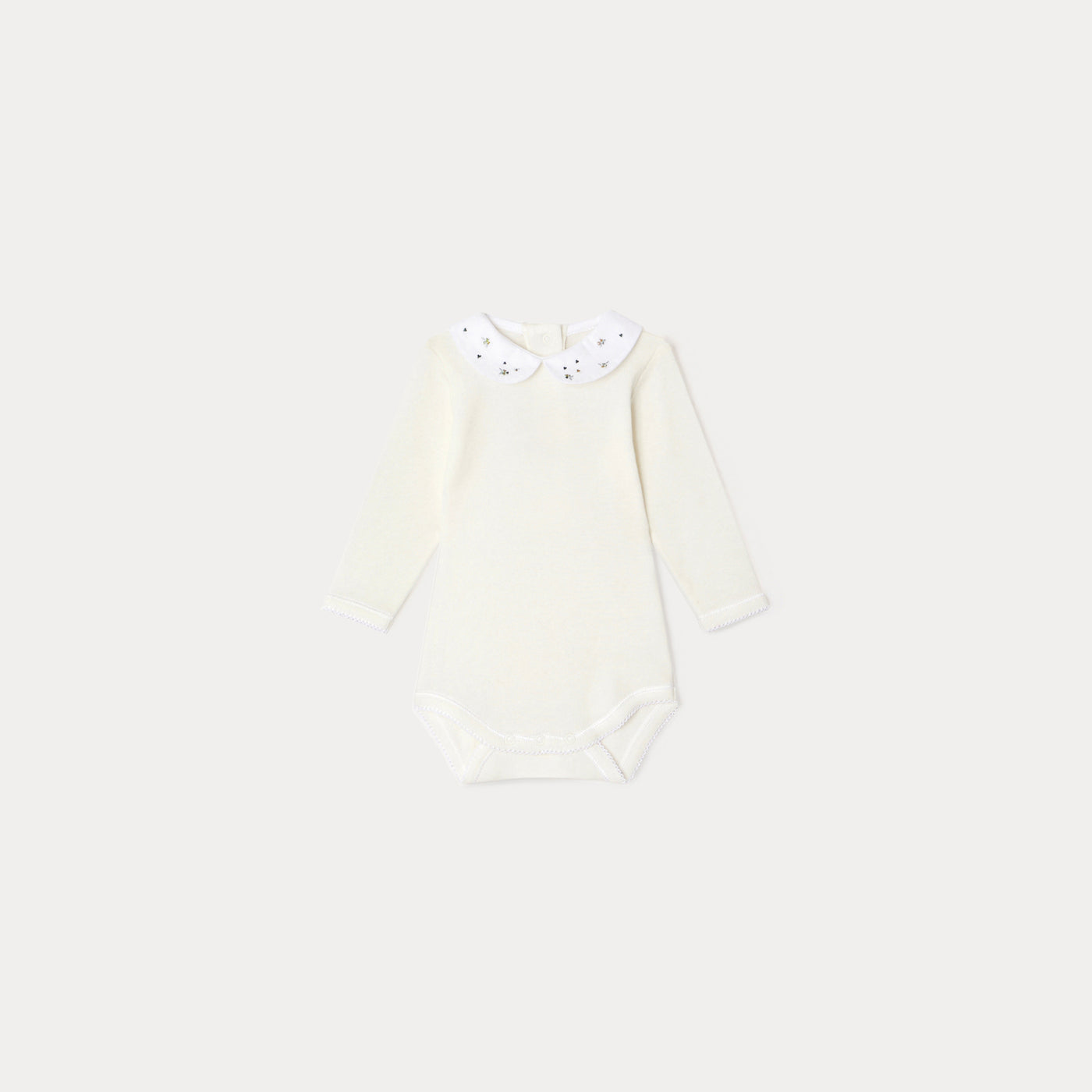 Bonpoint cream newborn onesie with embroidered collar