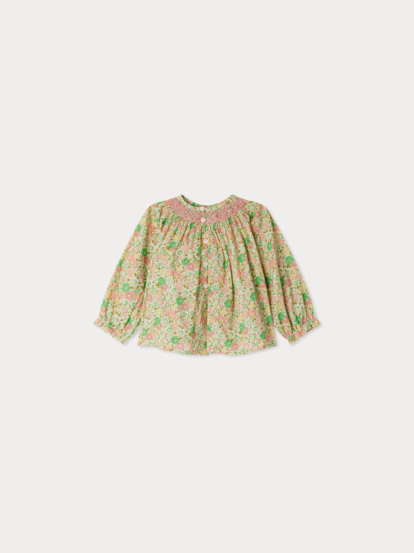 Griotte smocked blouse made with pale pink Liberty fabrics
