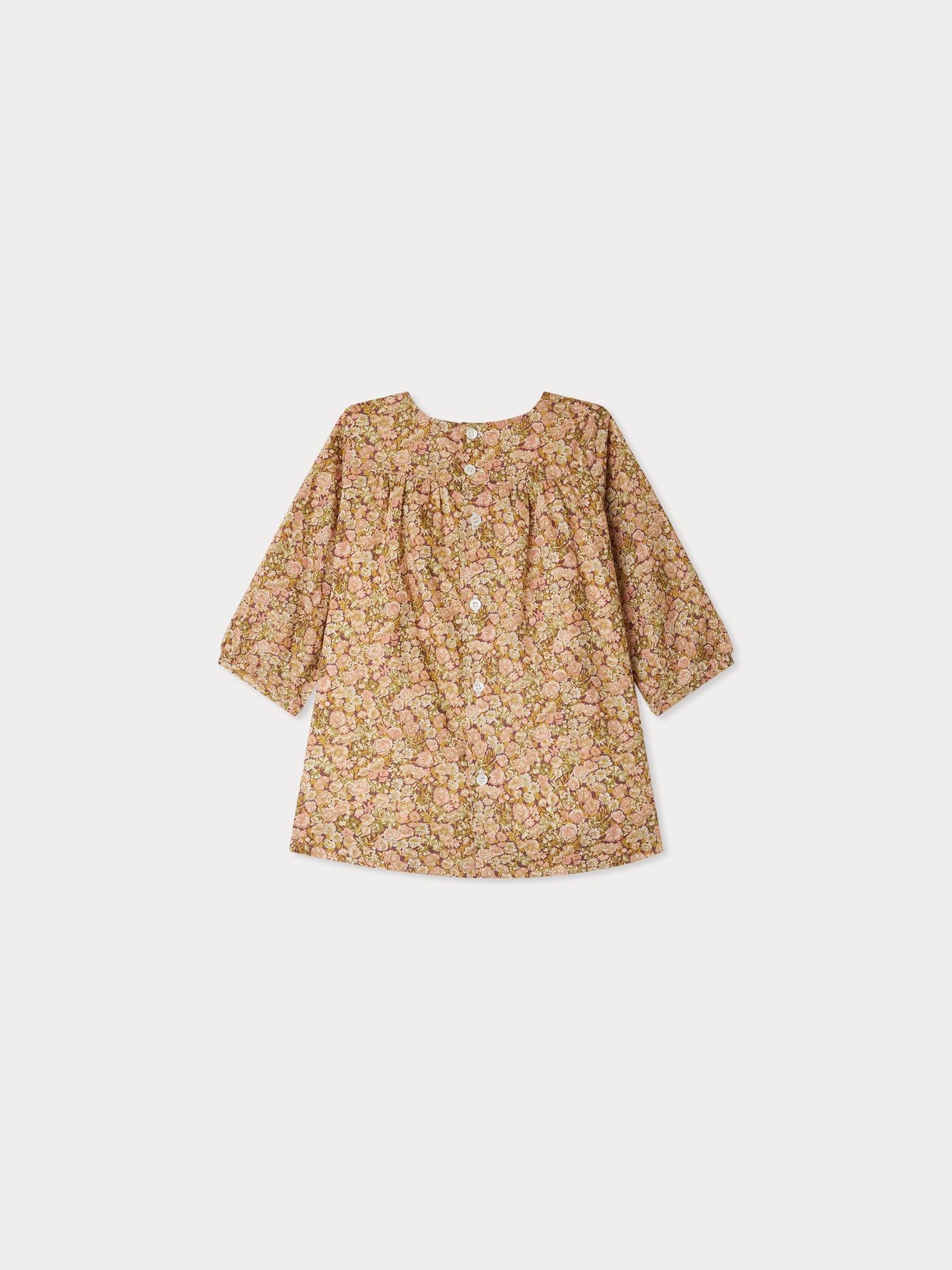 Félicie smocked dress made with camellia pink Liberty fabrics