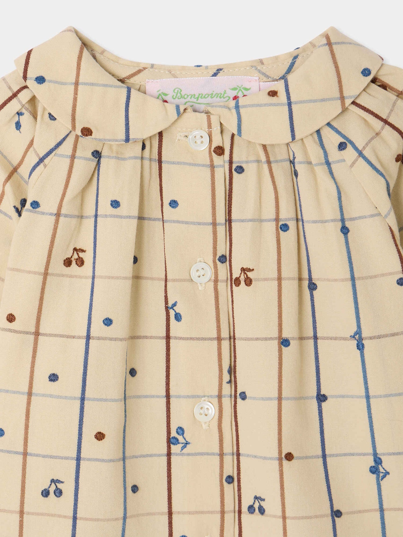 Domino baby blouse with Peter Pan collar and hand-embroidered cherries in organic cotton
