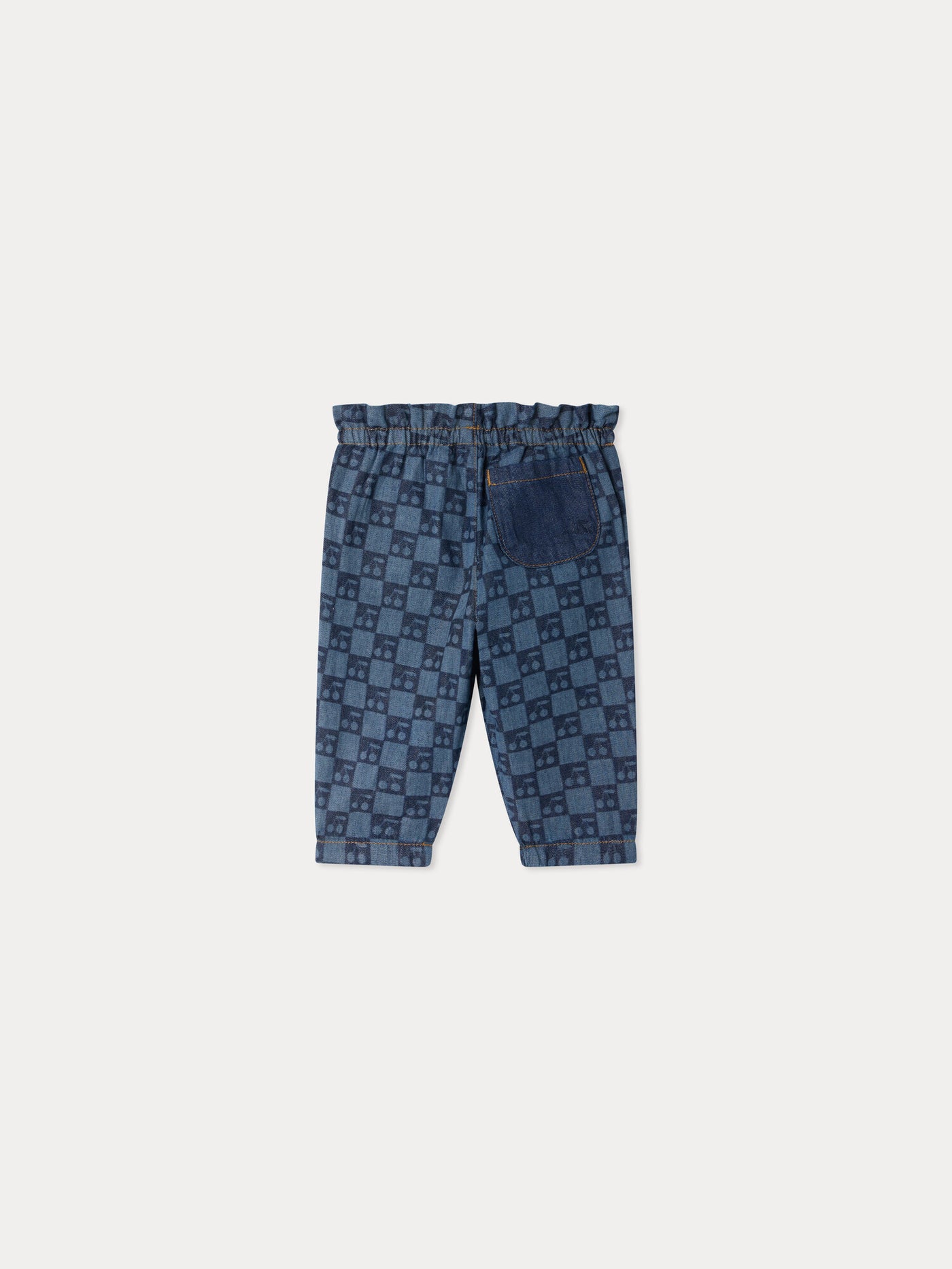 Luciole baby trousers with a cherry chequerboard pattern in organic cotton