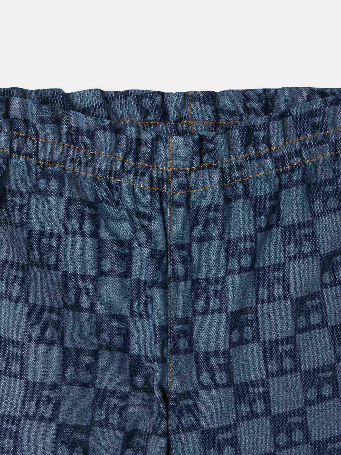 Luciole baby trousers with a cherry chequerboard pattern in organic cotton