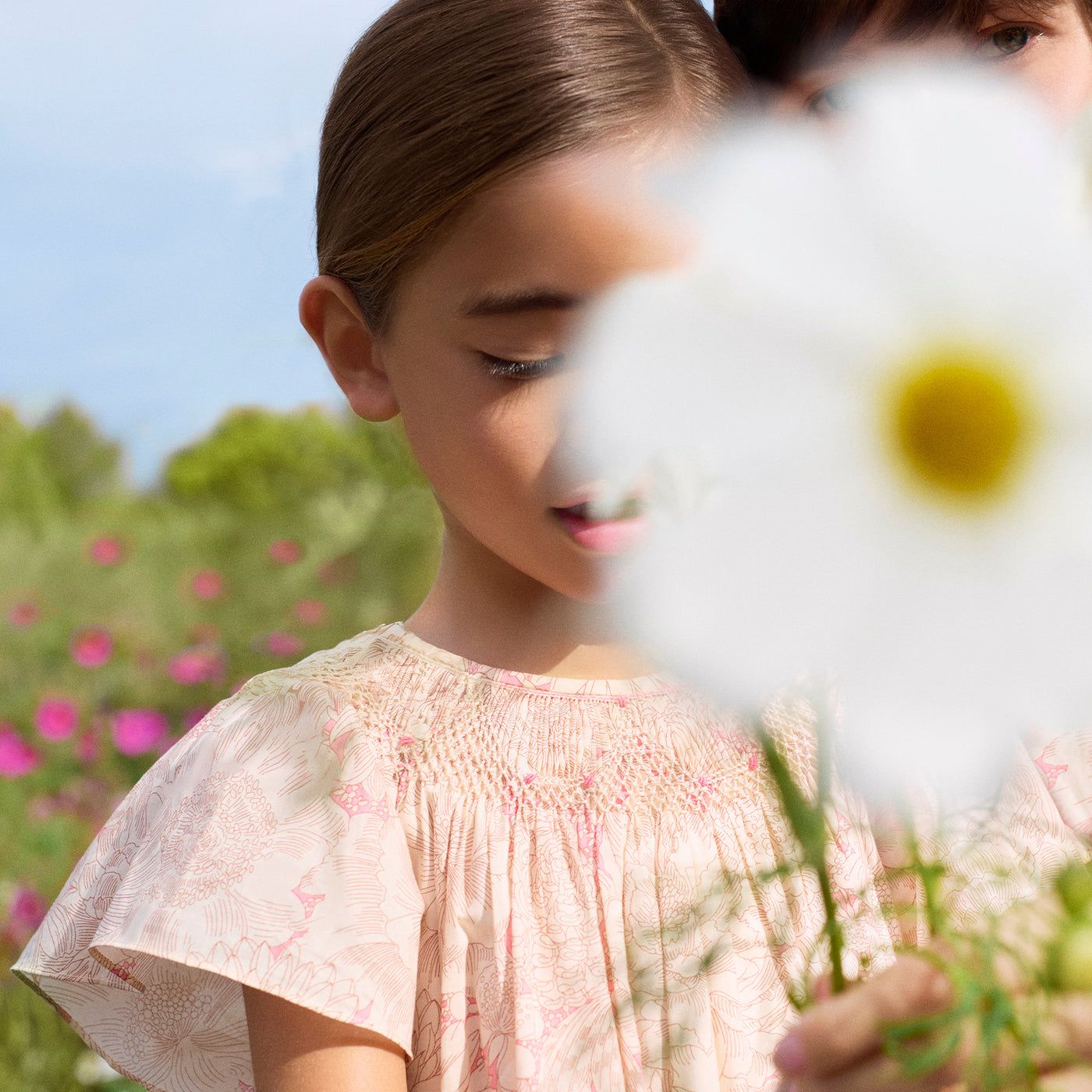 Adelice blouse smocked and hand-embroidered in Liberty organic cotton fabric