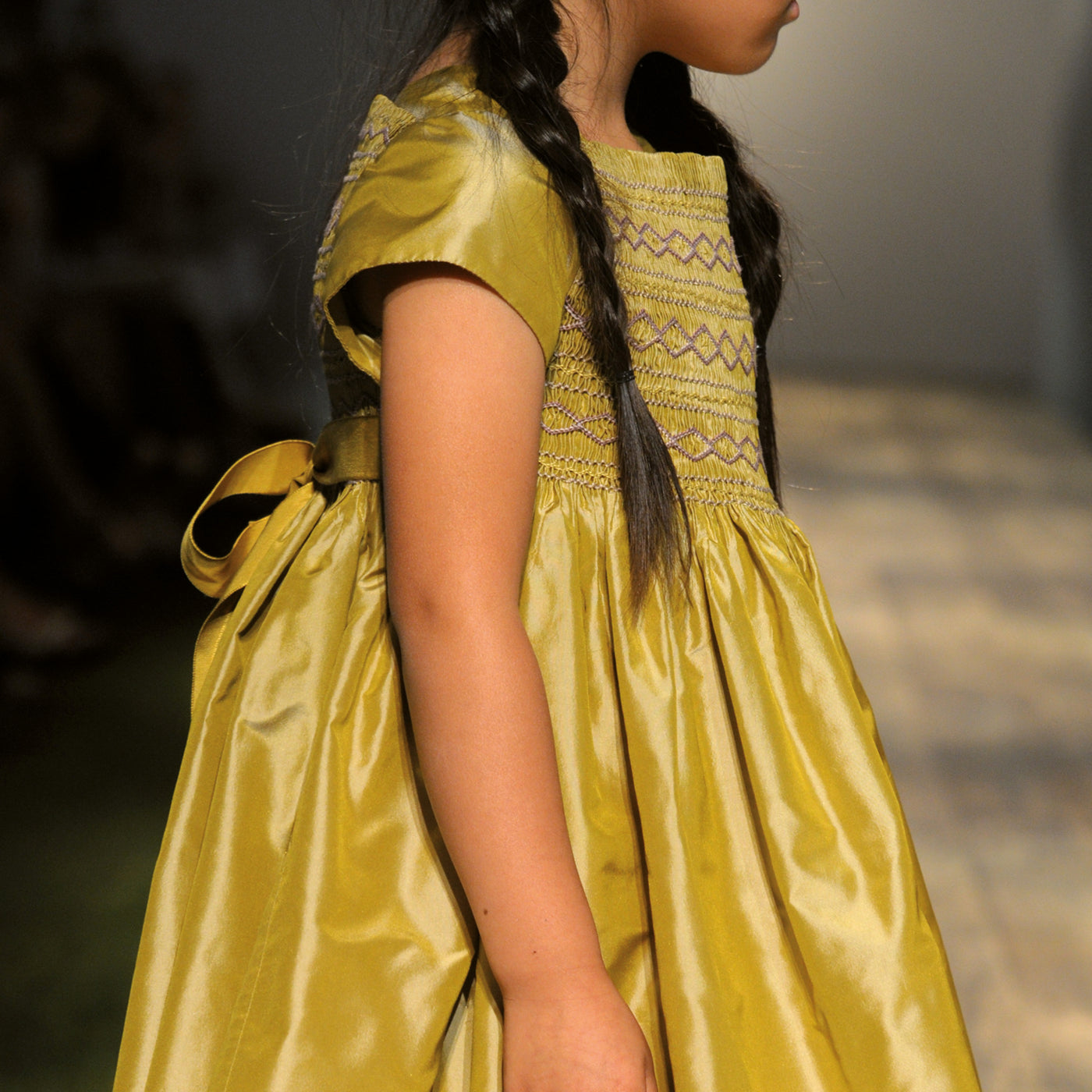Bonpoint girl with braids in yellow formal dress